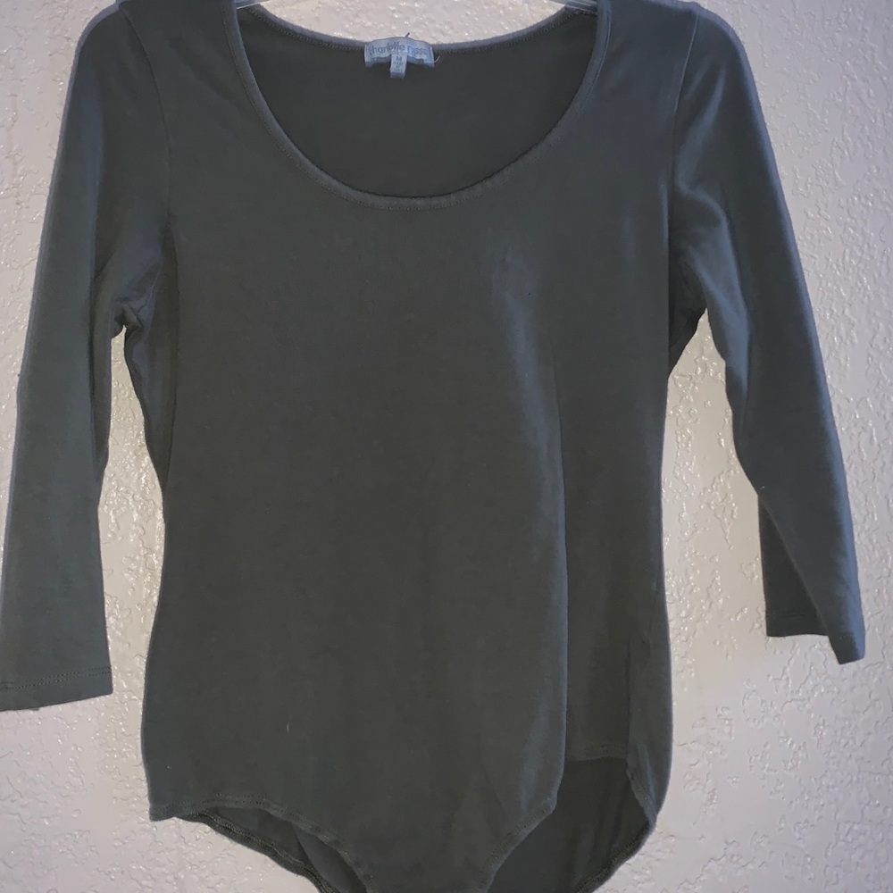 A navy green body suit.